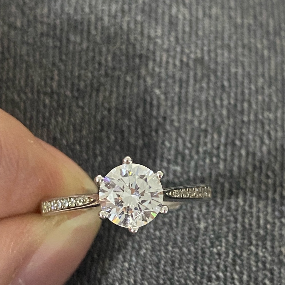 Silver-Tone Round Halo Solitaire Ring with Pavé Band